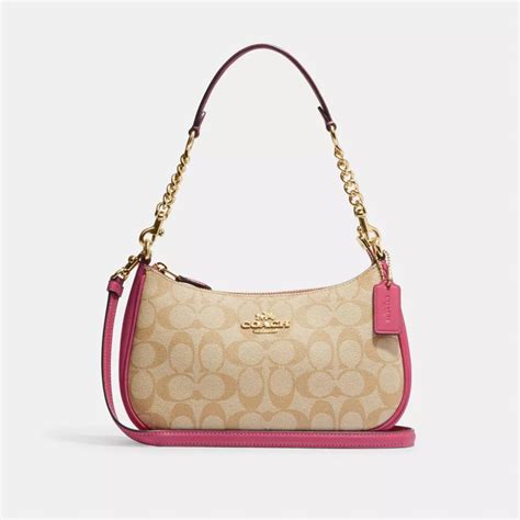 coach outlet signature shoulder bag.